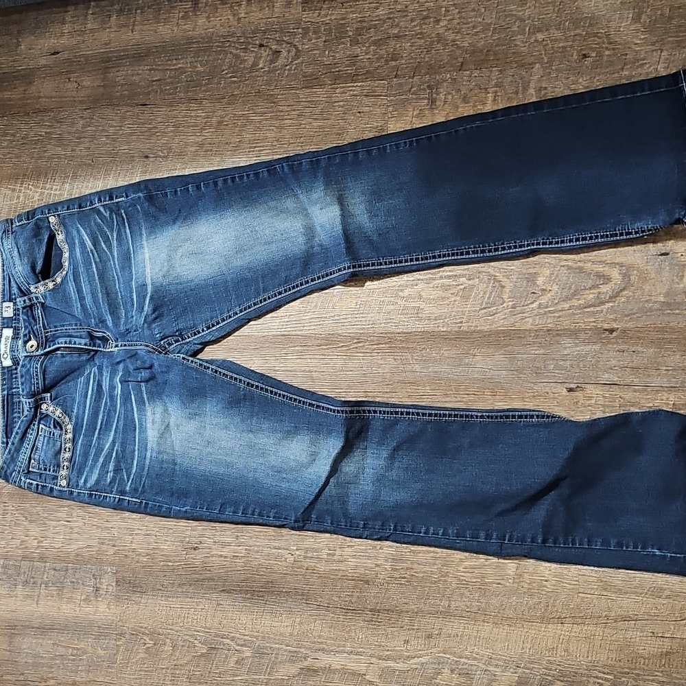 Blue Boot Cut Jeans with Distressed Finish